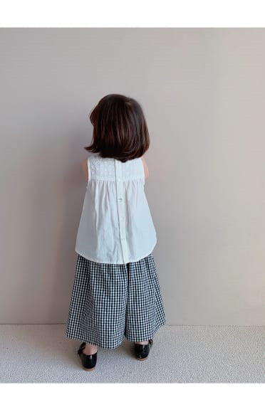 Girls White Vest Top and Checked Pants